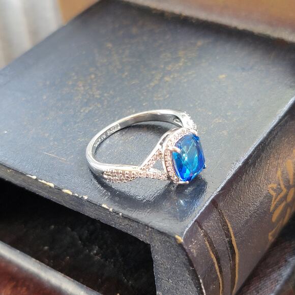 Rhodium Plated Simulated Sapphire Ring - Size 9 - Exquisite Crossover Design - Picture 10 of 12
